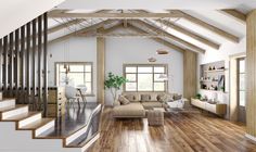 a living room filled with furniture next to a stair case in a loft style home