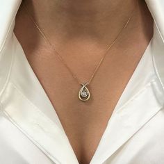 This Necklace Comes In 14k Yellow Gold Chain With 10k Yellow & White Gold Pendant Encrusted With 0.15 Cttw Diamond. Length Of The Necklace: 18 Inches, Pendant: 19mm, Total Weight 2.9 Gms. Comes With A Gift Box And An Appraisal Card. Id: 014354 Yellow Gold Teardrop Diamond Necklace With Prong Setting, 14k Gold Diamond Teardrop Pendant Necklace For Anniversary, Teardrop Diamond Necklace In 14k Gold For Anniversary, 14k Gold Diamond Necklace With Teardrop Pendant For Anniversary, Diamond Necklace With Teardrop Pendant And Diamond Accents, Fine Jewelry Solitaire Necklace With Pave Setting For Anniversary, Teardrop Diamond Necklace With 14k Gold Accents, Diamond Teardrop Pendant Necklace, Teardrop Pave Set Jewelry For Anniversary