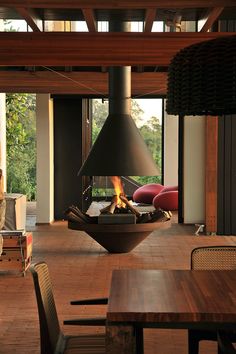 a large fireplace in the middle of a room