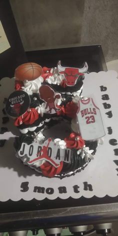 a cake that is decorated to look like a basketball jersey