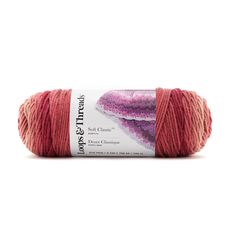 red yarn with purple speckles on it