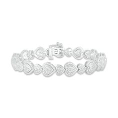 Beautiful horizontal hearts in alternating sizes line this shimmering sterling silver tennis bracelet. Brilliant round diamonds shine throughout for a total diamond weight of 1/2 carat. The 7.5-inch bracelet secures with a tongue clasp. Sixteen Wishes, Quiet Lifestyle, Heart Tennis Bracelet, Jacklyn Smith, Xoxo Jewelry, Silver Tennis Bracelet, Jewelry Accessories Ideas, Girly Accessories, Jewelry Fashion Trends