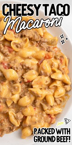 a white plate topped with macaroni and cheese covered in ground beef next to the words cheesy taco macaroni