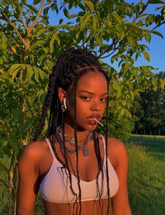 A Woman, Dreadlocks, Braids, White, Plaits