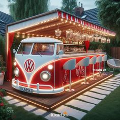 an old vw bus is parked in front of a bar with lights on it