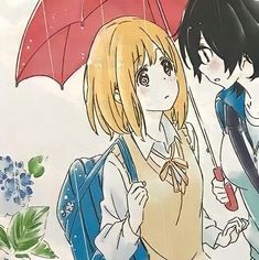 two people standing under an umbrella in the rain