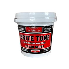 a white plastic container with black and red labels on the lid, which says brite tone