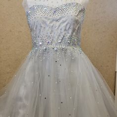 Beautiful Silver Dress With Ab Rhinestones , Tule Skirt. If You Have Any Questions Don't Hesitate To Ask. This Is A New Dress From My Boutique. I Can Always Help To Make Sure It Fits Your Kid. Embellished Fitted Tutu Dress For Pageants, Embellished Fitted Princess Dress For Prom, White Pageant Dress For Prom Season Party, Silver Party Dress, Silver Party, Silver Dress, Kids' Dresses, New Dress, Party Dress