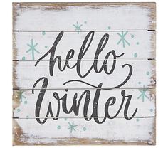 a wooden sign with the words hello winter written in black ink on white wood planks