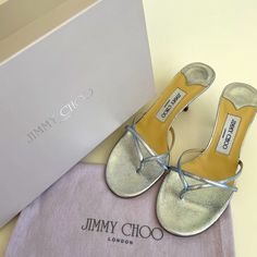 Jimmy Choo Metallic Blue Leather Kitten Heel Sandals Chic Slide Sandals Thong Style With Single Band Upper Leather Lining & Sole Eu Size 37 1/2 Us Size 7 1/2 Made In Italy Includes Original Jimmy Choo Shoe Box And Shoe Bag New! Never Worn! These Shoes Have Never Been Worn And Are In New, Unused Condition! Luxury Leather Toe Post Heels, Designer Almond Toe Sandals With Leather Sole, Designer Almond Toe Sandals With Heel Loop, Luxury Blue Sandals With Single Toe Strap, Designer Almond Toe Sandals With Heel Strap, Designer Almond Toe Sandals For Summer, Luxury Sandals With Branded Insole And Almond Toe, Luxury Sandals With Almond Toe And Branded Insole, Designer Sandals With Wrapped Heel And Almond Toe