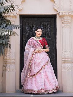 Introducing our collection of Indian ensembles, designed for every memorable moment. Explore our offerings, including attire for the joyful Haldi ceremony, graceful Bridesmaids' Lehenga Choli, intricate Mehendi ensembles, enchanting Engagement Ceremony Lehenga Choli, rhythmic Sangeet Ceremony Lehenga Choli, traditional Tilak/Sagan Ceremony outfits, radiant Haldi Ceremony Lehenga Choli, sophisticated Reception Lehenga Choli, heartfelt Blessing Ceremony ensembles, and opulent Indian wedding attire Reception Lengha, Pakistani Lehenga, Lehenga Choli Designs, Bridesmaid Lehenga, Indian Lehenga Choli, Reception Lehenga, Floral Lehenga, Party Wear Lehenga Choli, Bollywood Lehenga