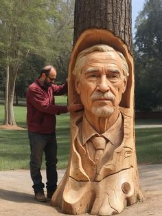 a man standing next to a carved wooden tree