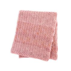 a pink knitted scarf on a white background