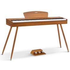 an electronic piano sitting on top of a wooden stand