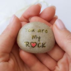 someone is holding a rock that says you are my rock