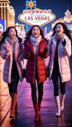 three women walking down the street in front of las vegas sign at night, with one woman holding her hand out