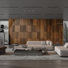 a modern living room with wood paneling and white furniture