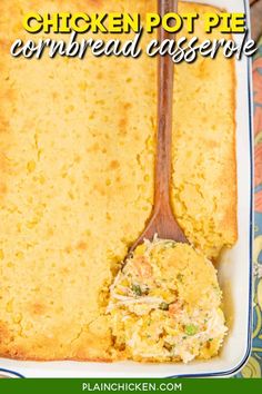 chicken pot pie cornbread casserole with a wooden spoon in the casserole