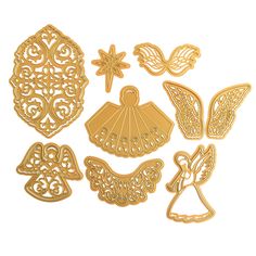 laser cut out dies with angels and angel wings in gold foil on a white background