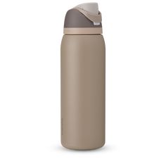 thermos bottle is shown in beige and grey, with a white cap on it