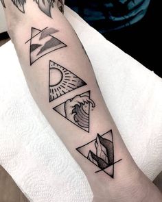 a person with a tattoo on their arm that has triangles and waves in the middle