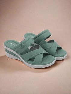 Elevate your style and comfort with our Siketu Tetra Cushioned Wedge Sandals. These dusty green sandals feature a cushioned wedge for all-day support, making them perfect for both casual and dressy occasions. Add a touch of sophistication to any outfit with the sleek design and comfortable fit. 2.36'' heel Slip-on PU upper Synthetic Arch support footbed™ Cushioned Insole™ Anti-skid rubber sole Shoe Makeover, Green Sandals, Reindeer Headband, Dusty Green, Dress Jewelry, Wedge Sandal, Elevate Your Style, Arch Support, Wedge Sandals