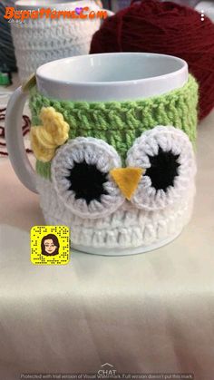 a crocheted owl coffee cup cozys up to the heat