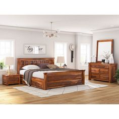 a bedroom scene with focus on the bed and dresser