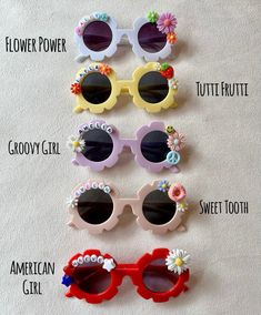 Dive into spring and summer time with these adorable sunnies for the kids! These are perfect for beach days, birthday party favors, photoshoots, flower girl gifts and MORE! These sunglasses are completely customized for whatever you would like! Step 1: - Please indicate what color sunglasses you would like Step 2:  - Let me know which style is your favorite! NOTE: The bead and flower colors will vary and placed as seen fit on to the sunglasses. Therefore, you can expect the style to look exactly the same but the colors of the beads will vary. I do have many colors so if you are looking for specific colors please let me know and I will try my best to accommodate to your exact request! Step 3: - Use the personalization box to let me know the name or text you would like on the sunnies as well Birthday Sunglasses, Sunglasses Party Favor, Novelty Glasses, Diy Sunglasses, Beaded Sunglasses, Baby Sunglasses, Flower Sunglasses, Custom Sunglasses, Party Sunglasses