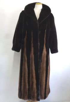 "BEAUTIFUL & VERY STYLISH CANADIAN DARK RANCH  & DEMI BUFF MINK FUR COAT FOR MEN! IT IS MADE FROM FULL SKINS \"LET OUT\", THE BEST! THE COLLAR TYPE IS \"SHAWL\", IT CLOSES WITH FRONT HOOK & EYE CLOSURES AND HAS SIDE POCKETS AND BRACELET CUFFS. THIS ITEM IS REFURBISHED NEW, MADE TO MEASUREMENT! AFTER BUYING THIS ITEM, IT WOULD BE VERY MUCH APPRECIATED IF YOU COULD PROVIDE YOUR HEIGHT, WEIGHT AND BUST CIRCUMFERENCE, SO WE CAN ADJUST THE COAT TO YOUR SIZE, BEFORE SHIPPING, IF NEEDED. IT WILL ALSO H Beaver Fur Coat, Bracelet Cuffs, Black Raincoat, Headband Wrap, Coat For Men, Leather Coat Jacket, Fur Headband, Mink Fur Coat, Chevron Design