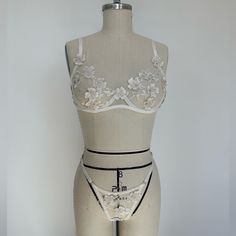 Brand New Never Worn. White/Ivory Floral Lingerie. Super Cute And Fun. Bridal Lingerie Or Summer Look. Adjustable Top & Bottoms. Elegant String Bra For Wedding, Elegant String Wedding Bra, Elegant Wedding String Bra, Lace Sheer Bra For Wedding, Sheer White Wedding Bra, White Sheer Wedding Bra, Wedding Lace Bra In Beige, White Delicate Wedding Bra, White Lace Delicate Bra