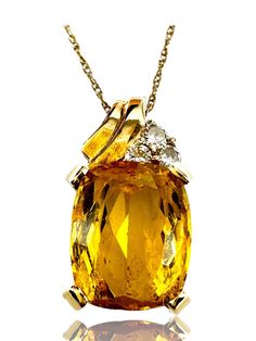 Add a touch of elegance to any outfit with our Necklace 14K Gold with a fine Chain. Featuring a stunning rectangular Yellow Citrine and Diamond, this 19" necklace exudes sophistication and beauty. Made with high-quality materials and a delicate chain, it's the perfect piece for any occasion! *Size: 19" necklace and .7" pendant *Materials: 14K Gold, 3 diamond and yellow citrine. *Condition:Vintage Great . Please look at all slides. Photos are considered part of the description and condition.  *Total Weight: 3.1 *Hallmark: cp 14k *This item has been evaluated using industry standard testing to ensure metal content and accuracy. All weights and measurements are estimated and approximate. *Jewelry may contain minor markings/imperfections throughout. *While we represent items accurately on our Elegant Yellow Rectangular Necklace, Elegant Yellow Rectangular Necklaces, Citrine Pendant, Yellow Citrine, Delicate Chain, Wedding Jewellery Necklace, Wedding Necklace, Citrine, Halloween Shopping