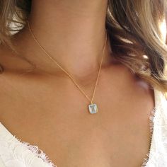 I love the way this aquamarine catches the light! This stunning, faceted pendant is framed in 14k gold over silver and hung on a 14k gold filled chain. Minimal and dainty and elegant - you'll love it! Shop Landon Lacey Jewelry » www.etsy.com/shop/landonlacey it's in the DETAILS . . . » 14k gold filled chain » Spring ring clasp » Aquamarine quartz (synthetic) it's in the OPTIONS . . . » Select your length (neck sizes and body types vary - please measure or add an extender) » Select your chain (ca Light Blue Jewelry With Gemstone Accents For A Gift, Emerald Cut Aquamarine Gold Jewelry, Rectangular Blue Topaz Jewelry Gift, Gift Blue Topaz Rectangular Jewelry, Rectangular Light Blue Jewelry Gift, Aquamarine Gemstone Pendant Jewelry, Elegant Aquamarine Gemstone Necklace, Aquamarine Birthstone Pendant Jewelry, Gold Aquamarine Pendant Necklace