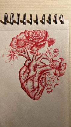 a drawing of a heart with flowers in it