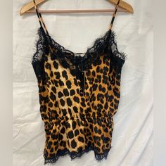 Akaiv Brand Woman’s Top Size Med. This Top Is Nwt. L26 P2p Is 14. There Is Designed Stretch To This Top. Chic Yellow Tops For Loungewear, Leopard Print Top, Print Top, Black N Yellow, Print Tops, Leopard Print, Womens Tops, Tank Tops, Yellow