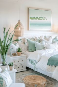 a bedroom with white and green bedding, wicker baskets on the nightstands