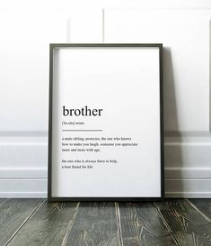 a black and white framed poster with the words brother on it sitting in front of a wall