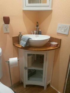 a bathroom with a sink and mirror in it