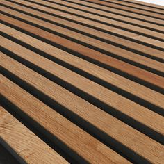 a close up view of the slats on a wooden bench