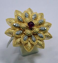 14K Gold Diamond set Large Cocktail Floral Ring. USA Ring size-7.5. Size of top-4 cm, weight-13.537 grams. Traditional Rings With 17 Jewels For Gift, Exquisite Gold Ring With Stone Setting, Exquisite Gold Rings With Stone Setting, Yellow Gold Ring For Celebration, Unique Hand Set Gold Rings, Celebration Yellow Gold Ring Jewelry, Celebration Yellow Gold Ring, Gold Flower Ring With Stone Setting For Gift, Gold Flower Ring With Stone Setting As Gift