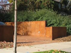 a large metal box sitting on the side of a road