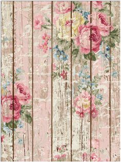 an old wooden wall with flowers painted on it's sides and wood planks in the background