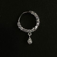 Name of Product: Bridal Traditional Jewelry Indian Nose Ring. It requires a hole in the nose ( piercing is required ) Unfortunately no exchanges /refunds due to hygiene reasons Diameter: 1.5/1.9 Centimeter Platting: Silver Material: Copper To view our latest collection of Nose rings / Nath please click the below link. https://www.etsy.com/uk/shop/HemrajJewellers?ref=seller-platform-mcnav§ion_id=30100702 Jewelry care instructions : 1. Please wipe the jewelry with a piece of cotton cloth after usa Nose Piercing Ring Diamond, Latest Nose Ring Designs, Desi Nose Ring, Nose Rings Silver, Traditional Jewelry Indian, Indian Nose Piercing, Bridal Nath, Nose Ring Indian, Nath Nose Ring