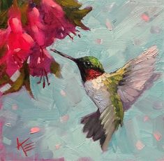 a hummingbird hovering over pink flowers in the water