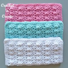 three crocheted headbands are lined up together