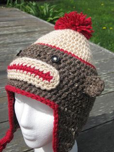 Pattern Sock Monkey Hat PDF PATTERN  baby to adult by lizzziee, $3.99 Sock Monkey Aesthetic, Beanie Earflap, Beanie Aesthetic, Crochet Monkey Hat, Hat With Braids, Sock Monkey Hat, Monkey Hat, Knit Ideas, Crochet Socks