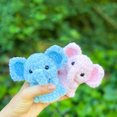 two small stuffed elephants are held up in front of a green background with the words free pattern