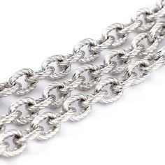 a silver chain is shown on a white background