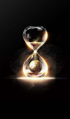 an hourglass with the earth in it and light coming out from underneath, against a black background