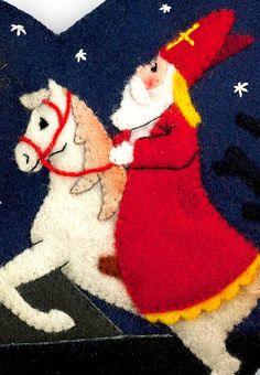 a santa clause riding a white horse through the night sky